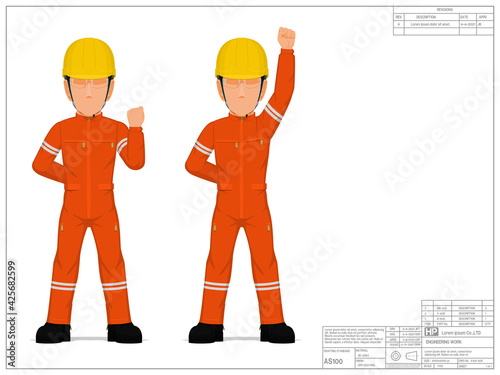 Two industrial workers are raising his clenched fist