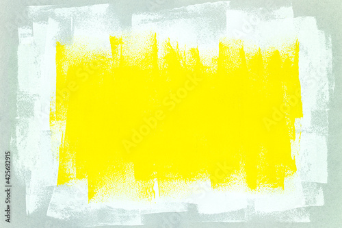 abstract yellow and white paint roller strokes on gray background