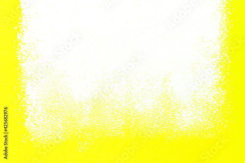 abstract roller brush painting in white color on yellow background