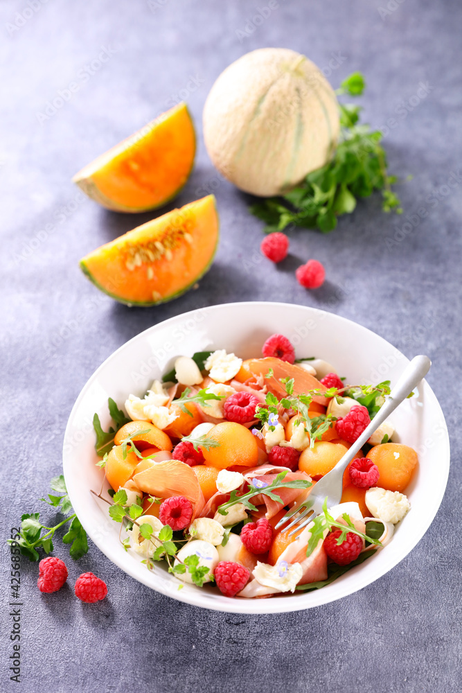 melon salad with raspberry, mozzarella and ham melon salad with raspberry, mozzarella and ham