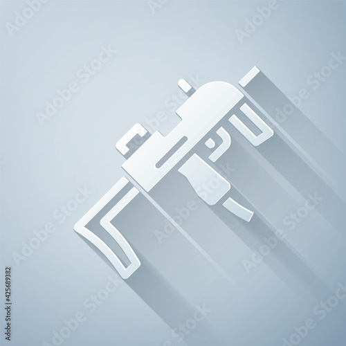 Paper cut MP9 submachine gun icon isolated on grey background. Automatic weapon. Paper art style. Vector