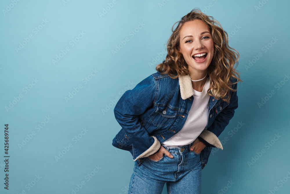 Blonde happy woman laughing and looking at camera Blonde happy woman laughing and looking at camera