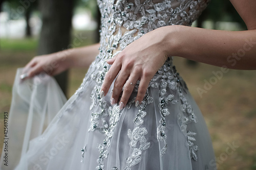 Fotografie Elegant female hands with thin fingers