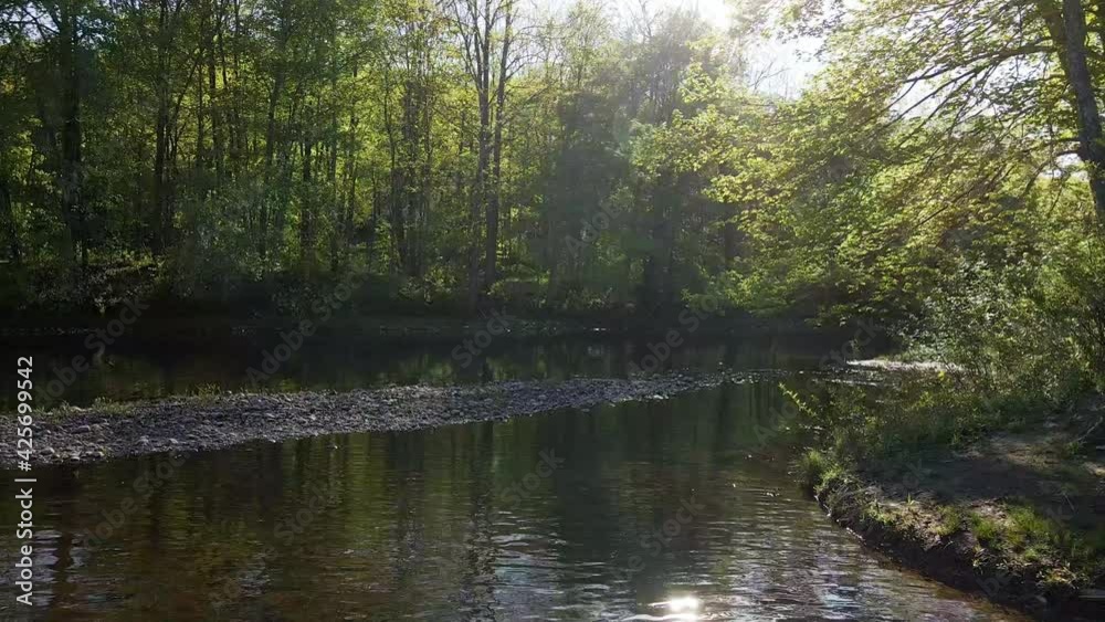 Low flying drone to reveal sun on the Farmington River.