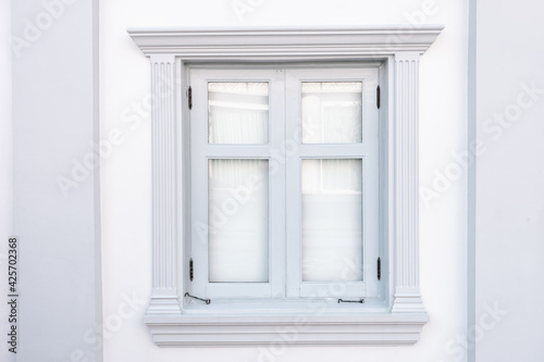 Front View of Window Vintage Styles With Exterior Decoration, Double Transparent Glass Windows and Architecture Facade Design. Residential Home Window With Reflection © Maha Heang 245789