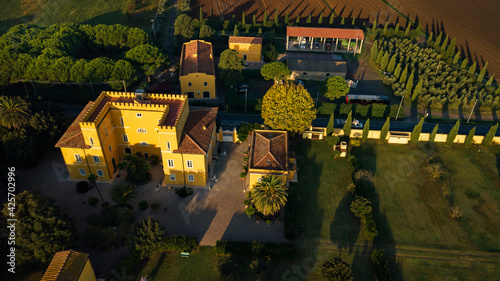 Top view of an old yellow villa in the Tuscan region.Italy photo