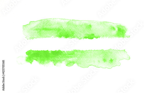 Hand-painted brush stroked abstract green watercolor on white paper background, for design, wallpaper, banners, text..