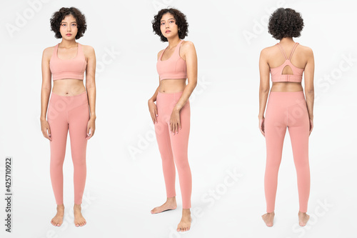 Woman in pink sports bra and leggings with design space set photo