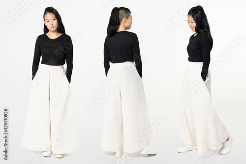 Asian woman in white palazzo pants with design space casual wear fashion full body