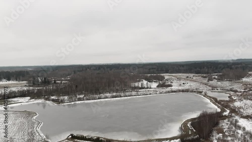 Countryside view with ploved agriculture fields and farm