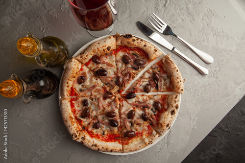 fresh italian pizza on gray background