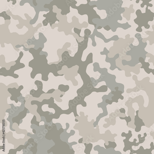 Seamless camouflage pattern. Military camouflage texture. Light brown soldier desert camo. Vector fabric textile print designs. 