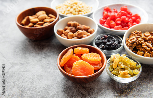 Bowls with various dried fruits and nuts