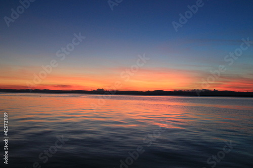 sunset over the sea © Agus