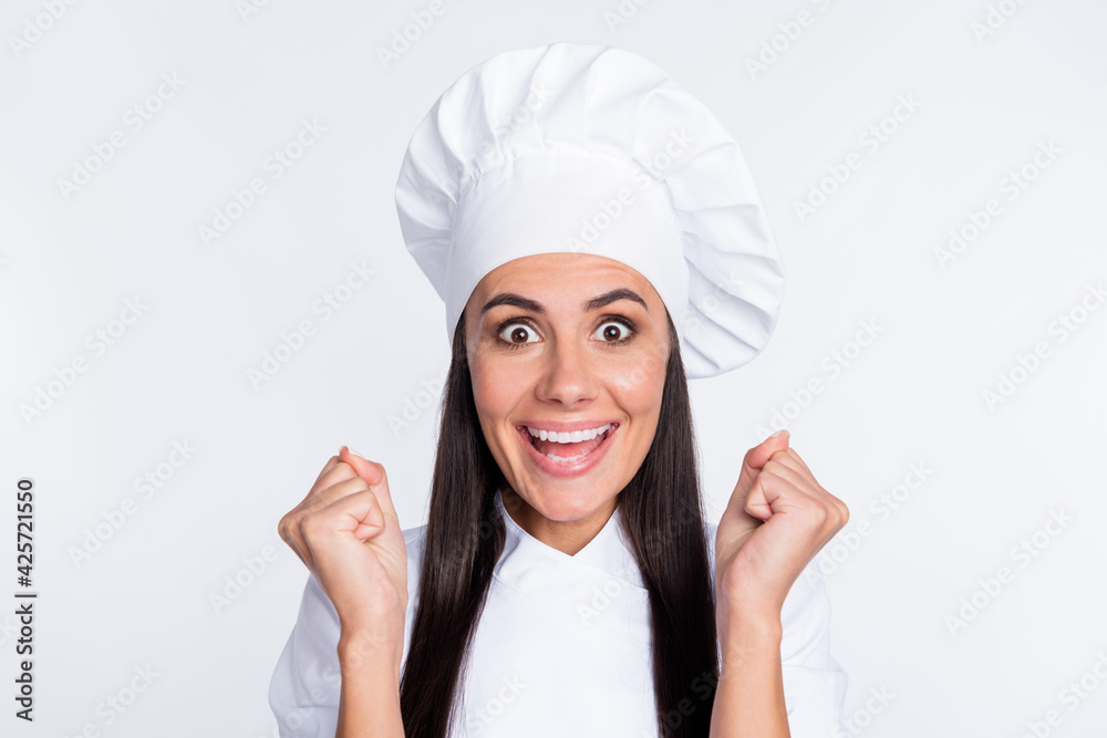 Portrait of astonished pretty lady fists up open mouth unbelievable reaction isolated on white color background