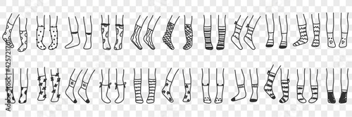 Socks for wearing doodle set. Collection of hand drawn human high and short socks accessories fashion for warming up feet with various patterns isolated on transparent background