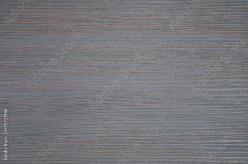 Rough textured surface in gray color imitation of wood close up