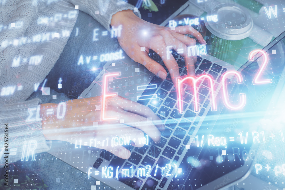 Double exposure of woman hands typing on computer and formula hologram drawing. Education concept. Double exposure of woman hands typing on computer and formula hologram drawing. Education concept.