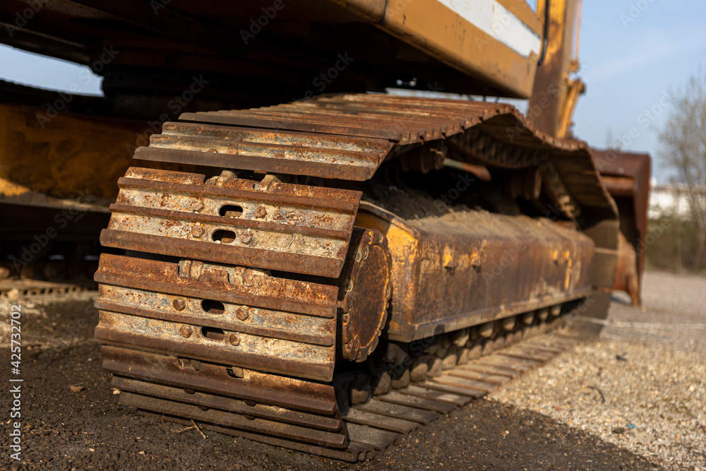 Fototapeta premium Excavator bogies or wheels.Heavy machinery at construction site