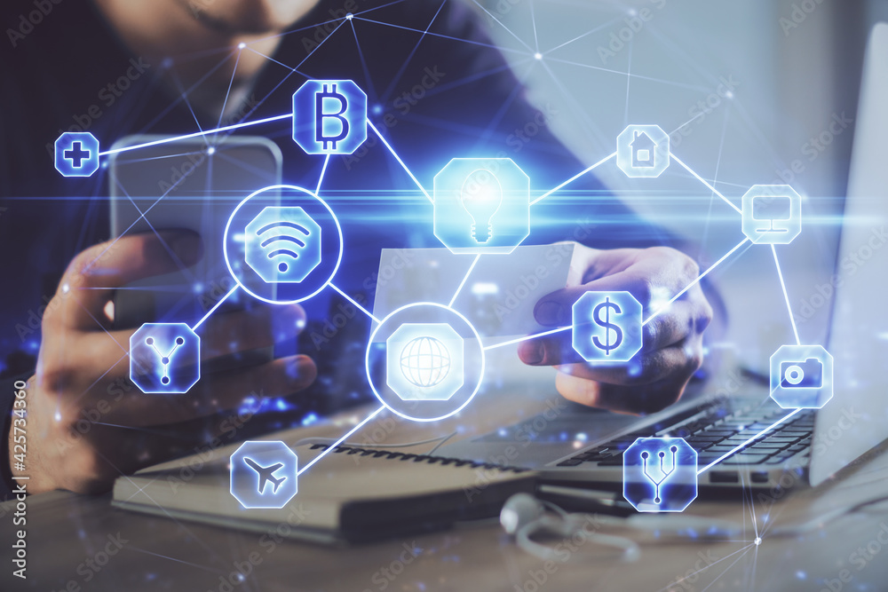 Double exposure of man's hands holding and using a phone and social network theme drawing. Double exposure of man's hands holding and using a phone and social network theme drawing.