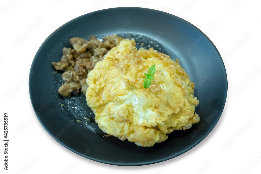 Fried pork with garlic and pepper and omelet over rice topping on white background. Fried pork with garlic and pepper and omelet over rice topping on white background.