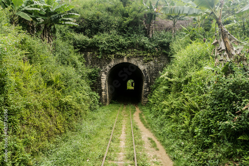 Fototapeta Naklejka Na Ścianę i Meble -  Two old tunnels in the jungle on the old Madagascarian FCE railway from Fianarantsoa to Manakara, Madagascar