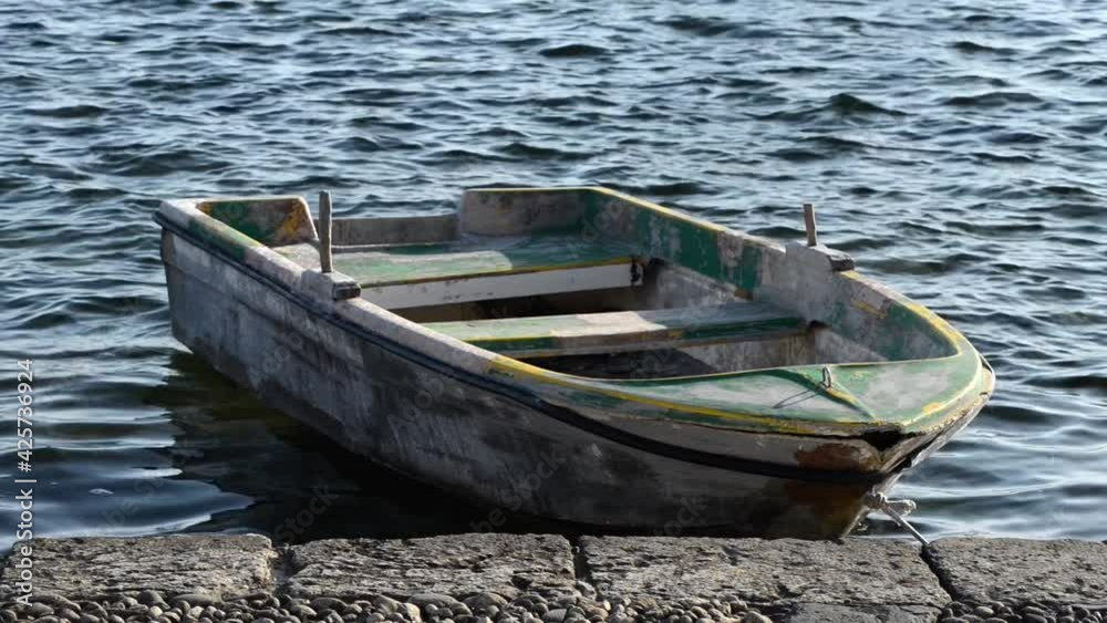 old wooden fishing boats tied to the mooring old wooden fishing boats tied to the mooring