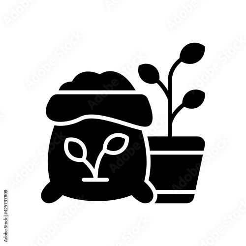vector illustration of fertilizer icon. fertilizer on the sack with plant and pot, use glyph design style