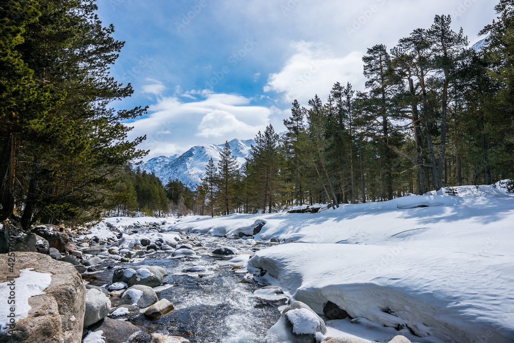 The river Baksan in winter. Caucasus mountains, Elbrus, Russia. The river Baksan in winter. Caucasus mountains, Elbrus, Russia.