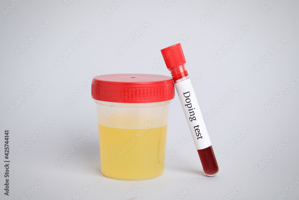 Jar and test tube with samples on light grey background. Doping control Jar and test tube with samples on light grey background. Doping control