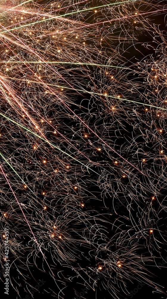Beautiful bright fireworks lighting up night sky