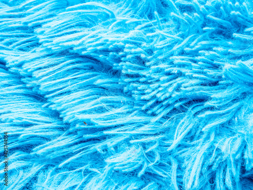 blaues Hochflor Teppich Muster