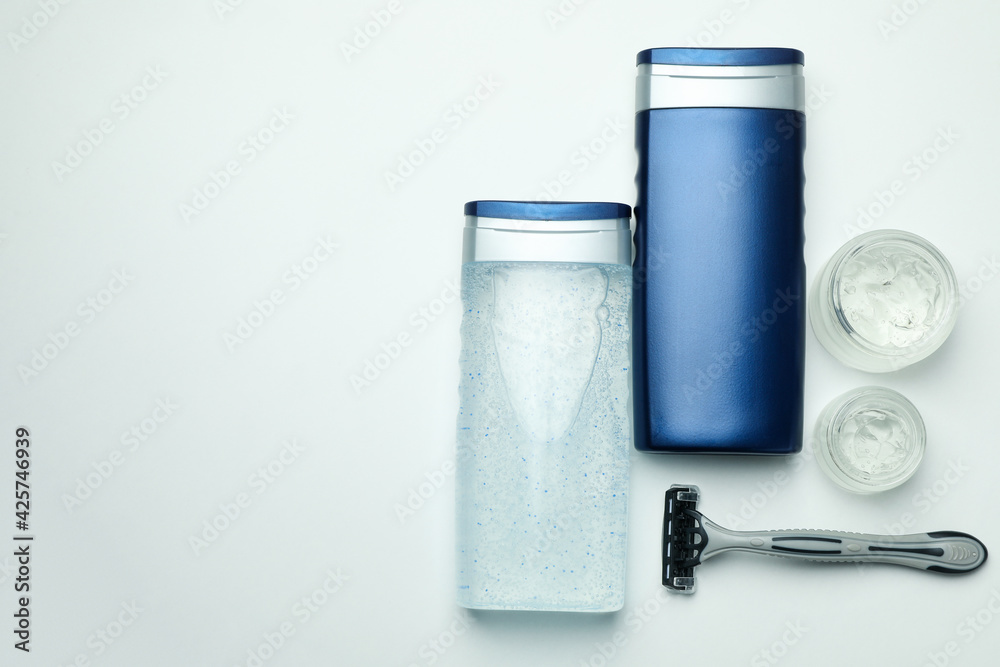 Concept of men's hygiene tools on white background