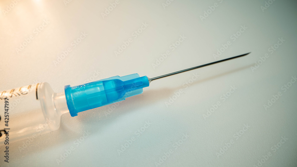 Syringe closeup isolated on white background Syringe closeup isolated on white background