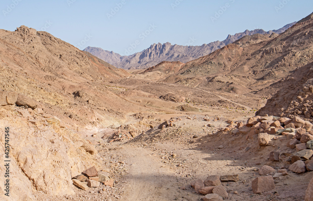 Barren desert landscape in hot climate