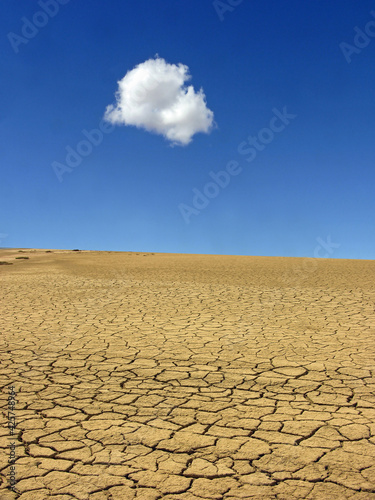 Lone cloud over over a dry landscape