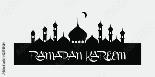 kufi kufic square Arabic Calligraphy of Ramadan Kareem with Muslim Mosque Silhouette