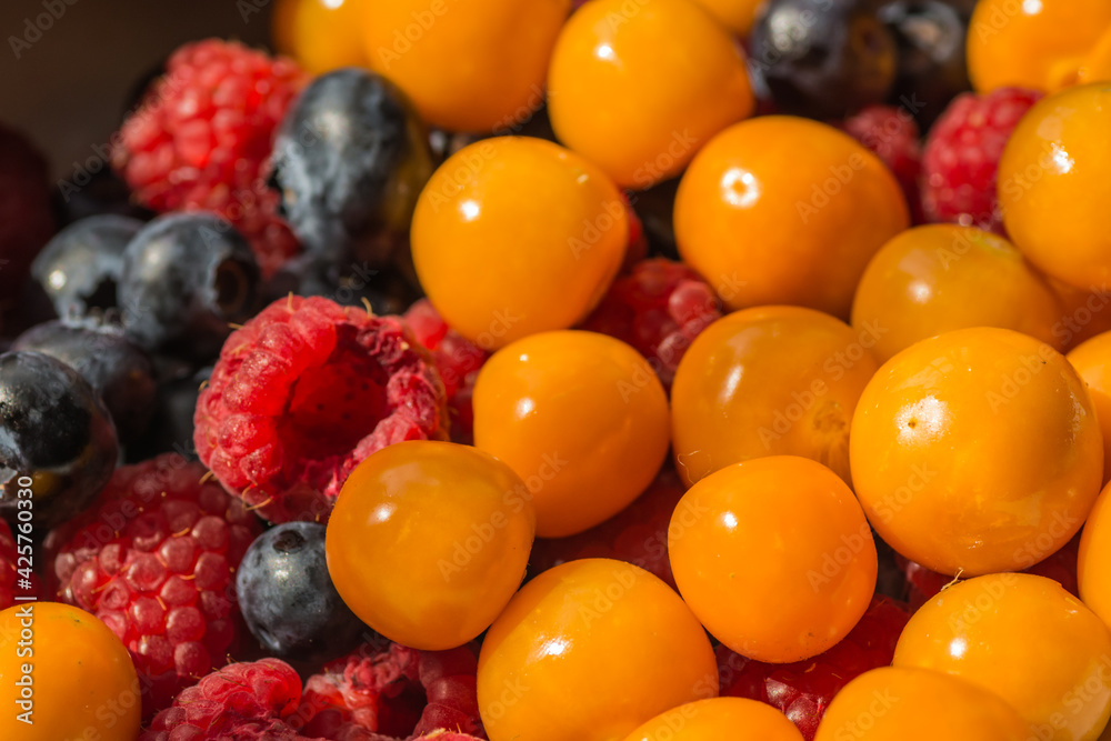 fresh physalis blueberries and raspberries fresh physalis blueberries and raspberries