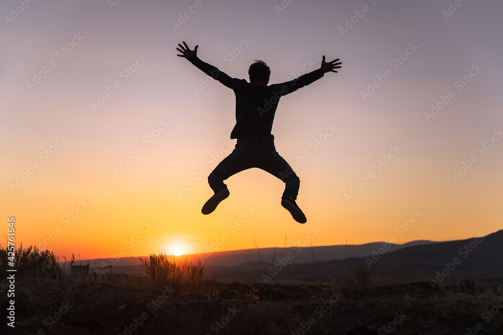 silhouette man at sunset