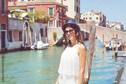 Beautiful Tourist Woman with White Dress  in Venice ,Italy  © boryanam