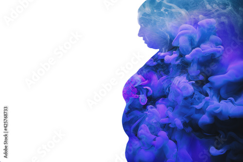 Weight loss. Double exposure shape. Body shaming. Blue purple smoke cloud in profile silhouette portrait of depressed unhappy overweight obese chubby woman isolated on white copy space background. photo