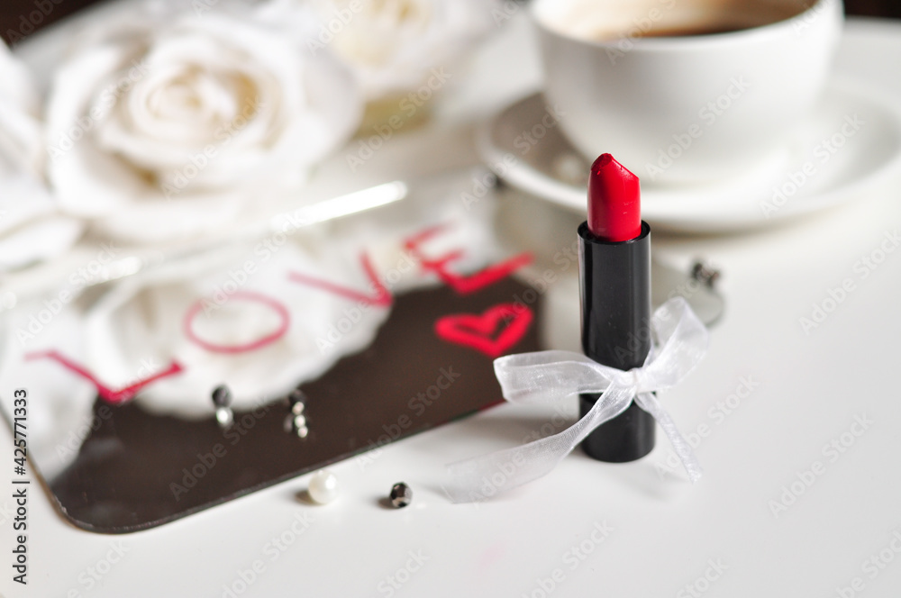 Inscription love on mirror with red lipstick Inscription love on mirror with red lipstick