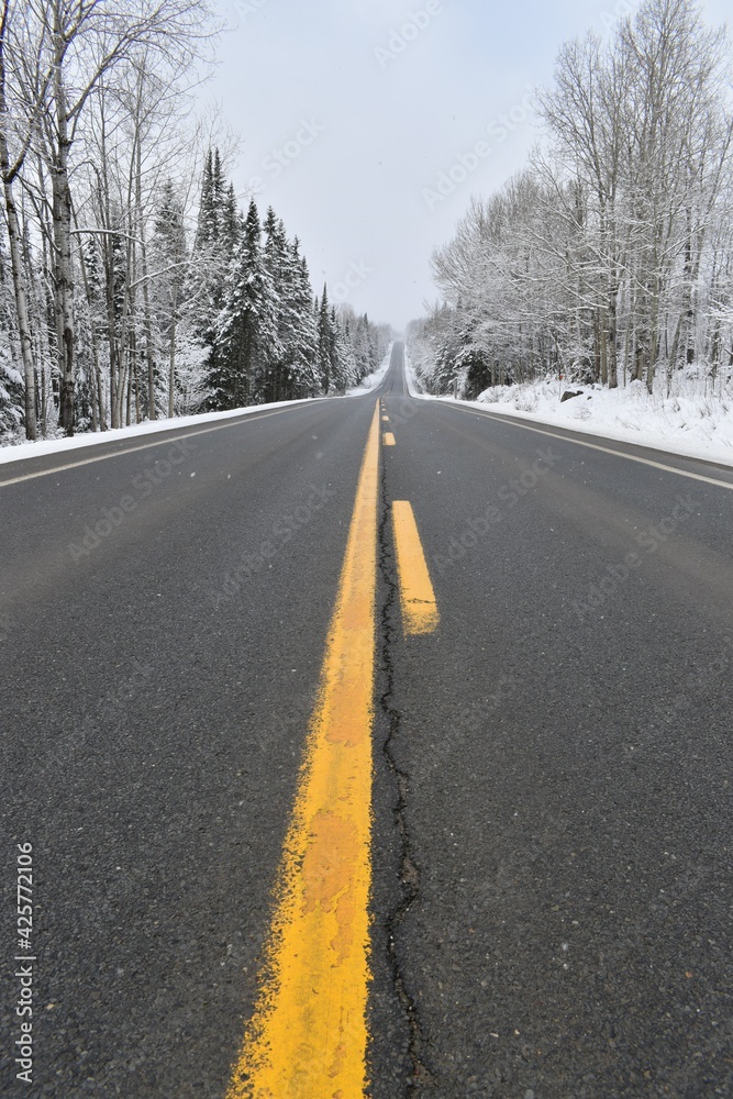 The road to Montmagny in the spring after a snowfall The road to Montmagny in the spring after a snowfall
