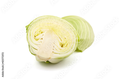 White cabbage head halves isolated on white background © mikeosphoto