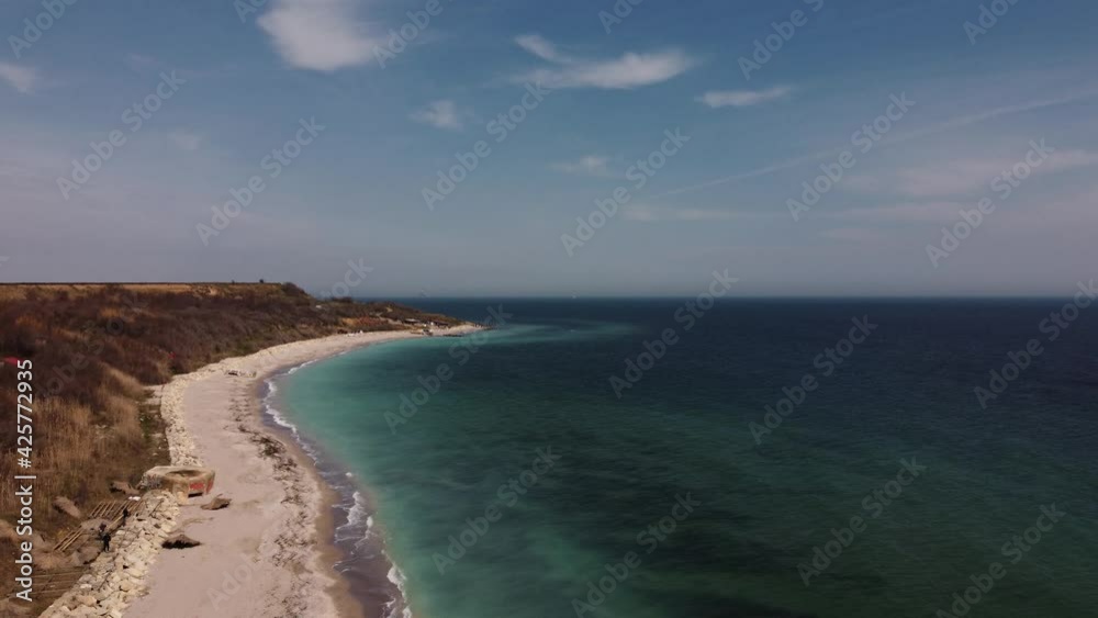 Aerial View Of Sandy Beach And Turquoise Water On a Beautiful Day Aerial View Of Sandy Beach And Turquoise Water On a Beautiful Day