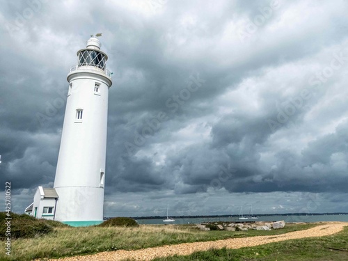 lighthouse at Hurst Point on a stormy summer day
