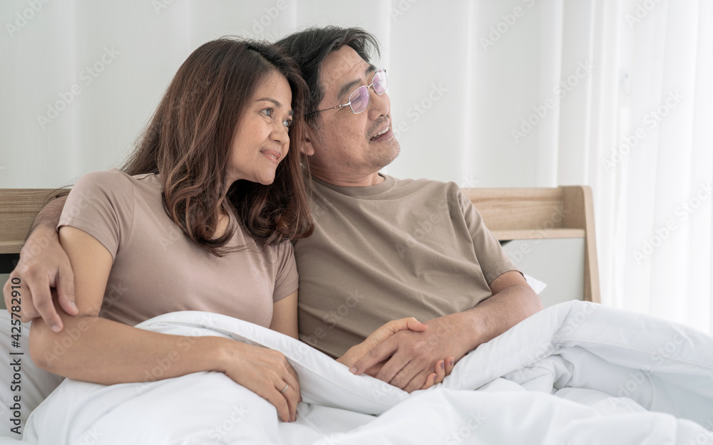 Asian elderly couple, Couple is enjoying spending time together at home, lockdown and quarantine lifestyle. Asian elderly couple, Couple is enjoying spending time together at home, lockdown and quarantine lifestyle.
