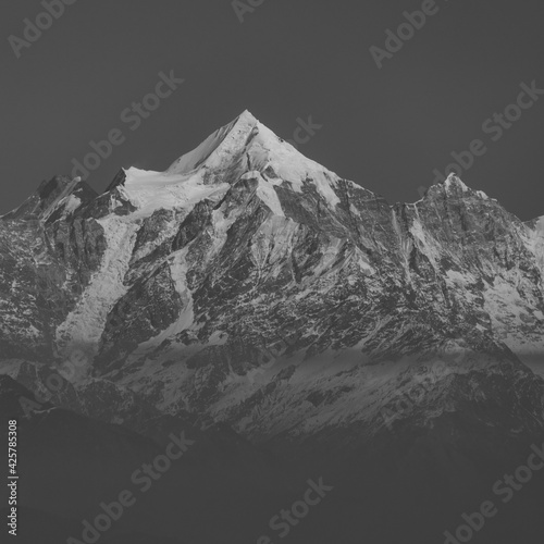 A Close up view of Nanda Devi peak and glacier in the Kumaun Himalayan range in monochrome 