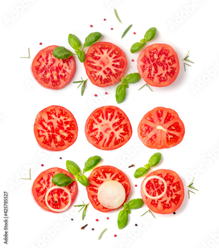 Fototapeta Naklejka Na Ścianę i Meble -  Sliced Tomatoes and Basil Top View and Flat Lay