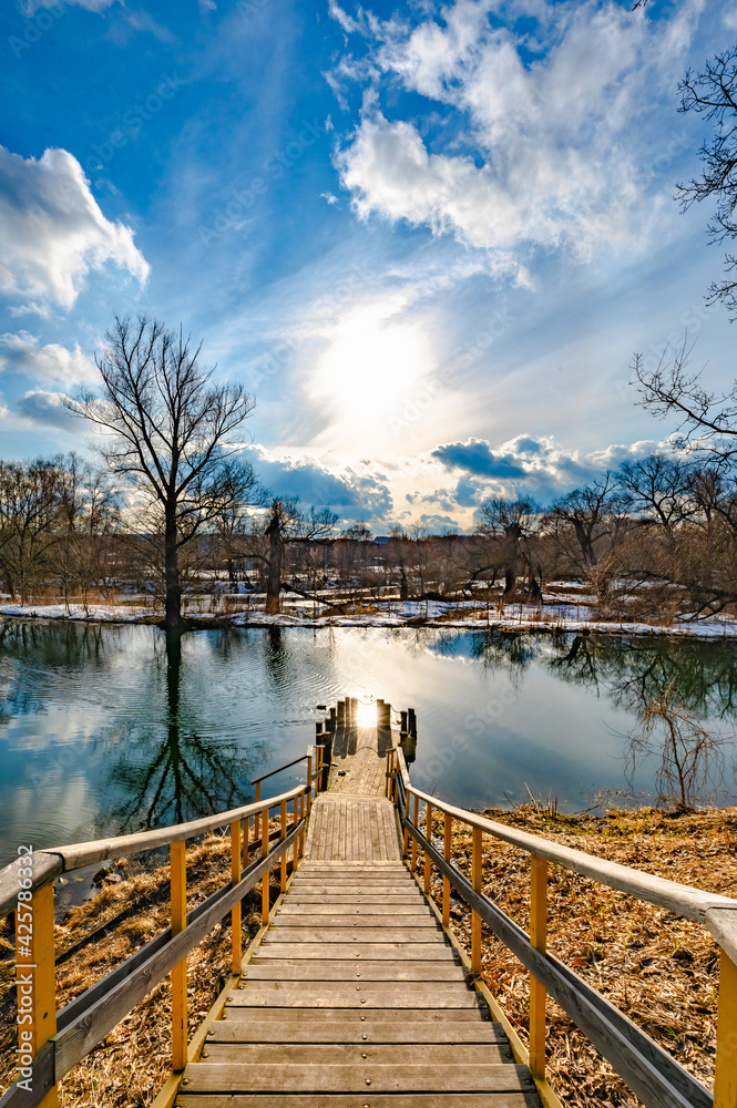 Fototapeta premium wooden bridge to the reservoir